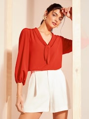 Friends Like These Red Petite V Neck Bow Front 3/4 Sleeve Blouse - Image 1 of 4