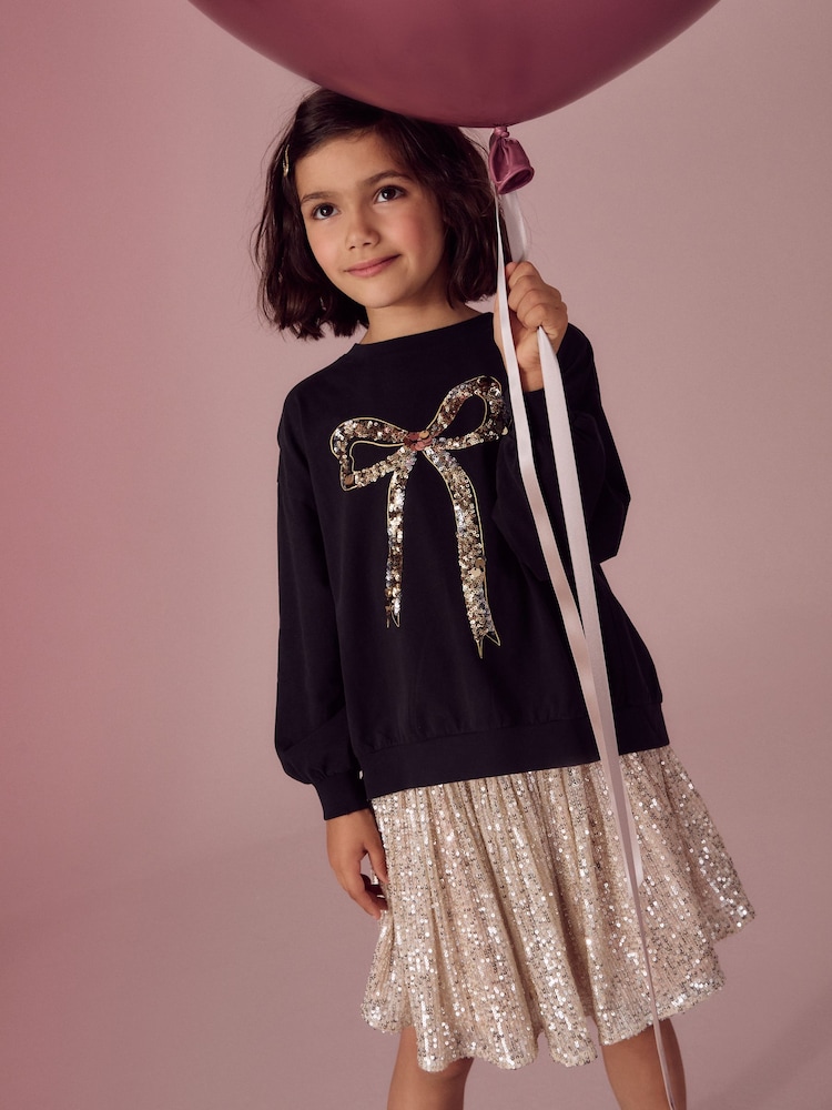Black/Gold Sequin Bow Long Sleeve Wrap Back 100% Cotton Top (3-16yrs) - Image 2 of 4