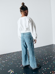 Blau Denim - Ausgestellte Jeans mit Verzierung aus 100 % Baumwolle (3–16 J.) - Bild 3 von 9