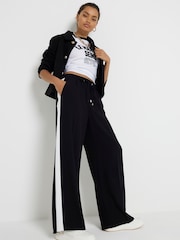 Черный - Широкие спортивные брюки с полосками по бокам River Island Petite - Изображение 1 из 8