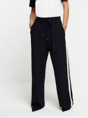 Черный - Широкие спортивные брюки с полосками по бокам River Island Petite - Изображение 5 из 8