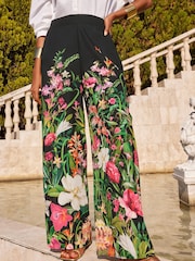 V&A | Love & Roses Black Floral Palazzo Wide Leg Trousers - Image 1 of 4