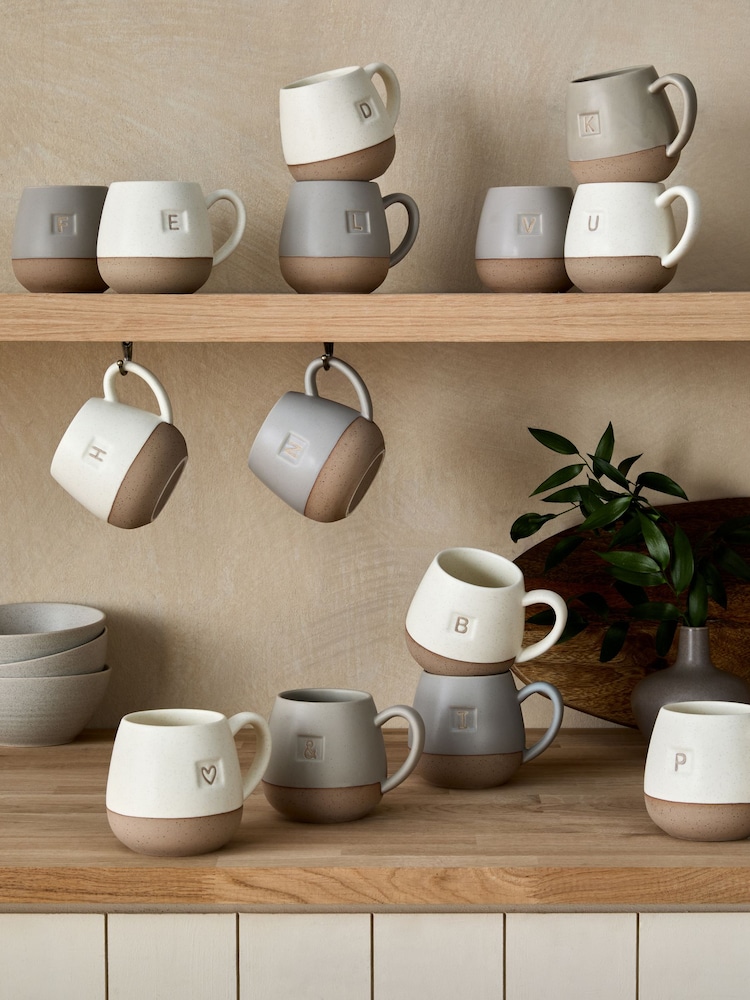 Alphabet gesprenkelte, glasierte Tasse - Bild 1 von 4 Alphabet gesprenkelte, glasierte Tasse - Bild 1 von 4