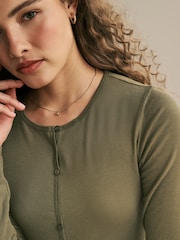 Olivno zelena - Mehka na dotik rebrasta pletena jopa s TENCEL™ Lyocell - Slika 4 iz 6