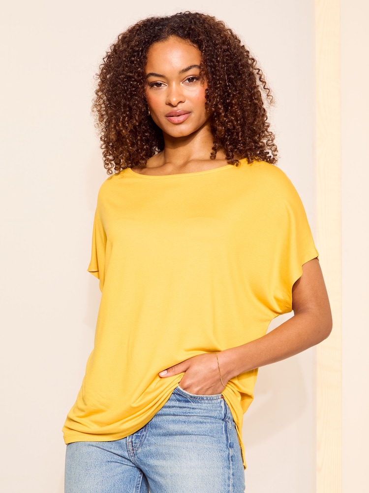 Friends Like These Yellow Soft Jersey Short Sleeve Slash Neck Tunic - Image 1 of 4 Friends Like These Yellow Soft Jersey Short Sleeve Slash Neck Tunic - Image 1 of 4