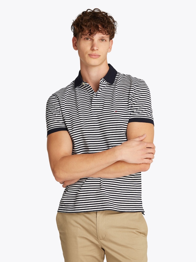أزرق داكن - قميص بولو قابل للتمدد بتصميم مستوحى من 1985 تلبيس قياسي من Tommy Hilfiger - صورة 1 من 8