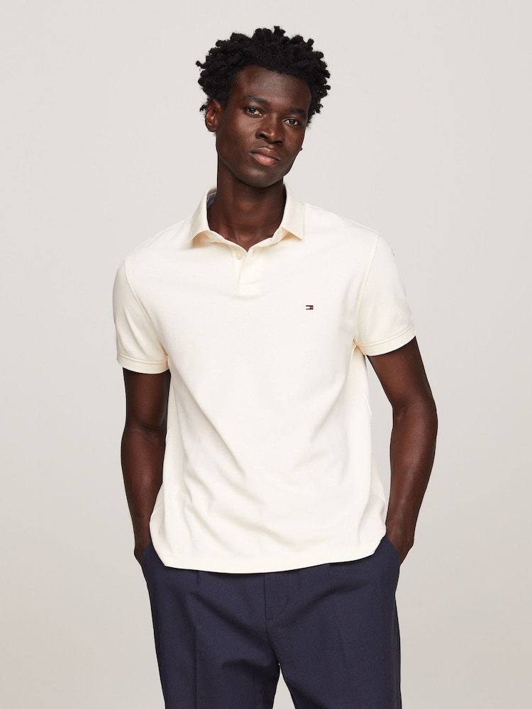 Natur - Tommy Hilfiger 1985 Polo-Shirt in Regular Fit - Bild 1 von 9 Natur - Tommy Hilfiger 1985 Polo-Shirt in Regular Fit - Bild 1 von 9
