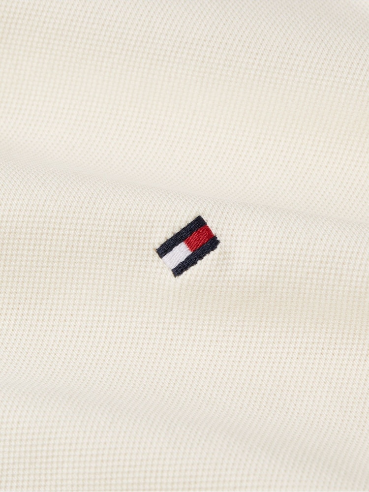 Natur - Tommy Hilfiger 1985 Polo-Shirt in Regular Fit - Bild 9 von 9 Natur - Tommy Hilfiger 1985 Polo-Shirt in Regular Fit - Bild 9 von 9