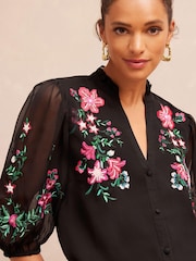V&A | Love & Roses Black Embroidery Floral Embroidered Ruffle V Neck Button Through Blouse - Image 1 of 4