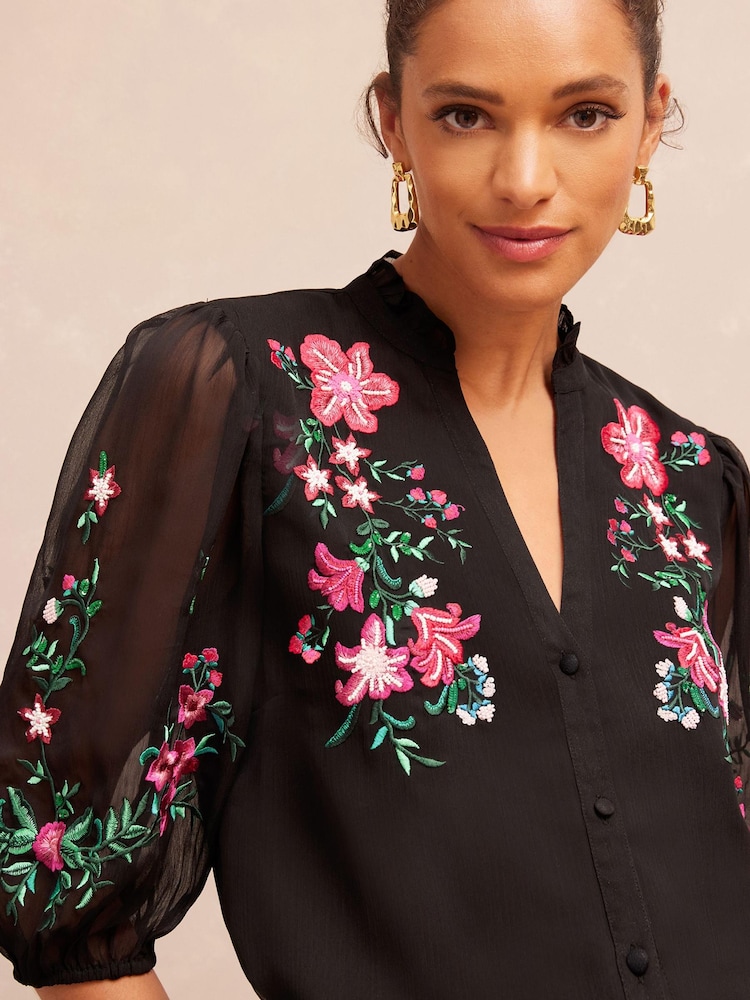 V&A | Love & Roses Black Embroidery Floral Embroidered Ruffle V Neck Button Through Blouse - Image 1 of 4