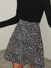 Lipsy Black Non Print Flippy Mini Skater Skirt - Image 1 of 4