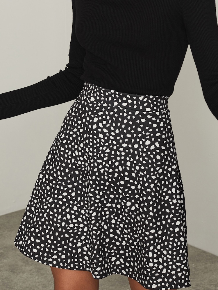 Lipsy Black Non Print Flippy Mini Skater Skirt - Image 1 of 4