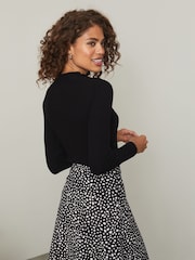 Lipsy Black Non Print Flippy Mini Skater Skirt - Image 2 of 4