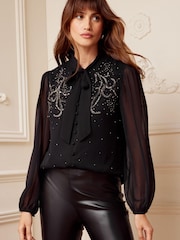 Schwarz mit Verzierung - Love & Roses Langärmelige Bluse mit gerafften Bündchen und Bindedetail am Ausschnitt - Bild 1 von 4
