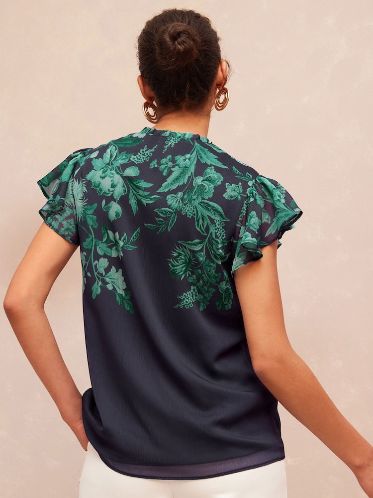 V&A | Love & Roses Teal Floral Printed Ruffle V Neck Flutter Sleeve Button Up Blouse - Image 2 of 4 V&A | Love & Roses Teal Floral Printed Ruffle V Neck Flutter Sleeve Button Up Blouse - Image 2 of 4