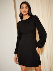 Friends Like These Black Knit Soft Touch Ruched Long Sleeve Mini Dress - Image 1 of 4