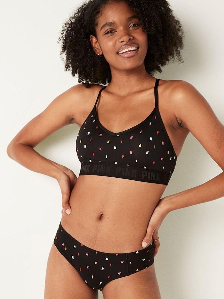 Victoria's Secret PINK Black Print Lightly Lined Low Impact Sports Bra - Image 1 of 3 Victoria's Secret PINK Black Print Lightly Lined Low Impact Sports Bra - Image 1 of 3