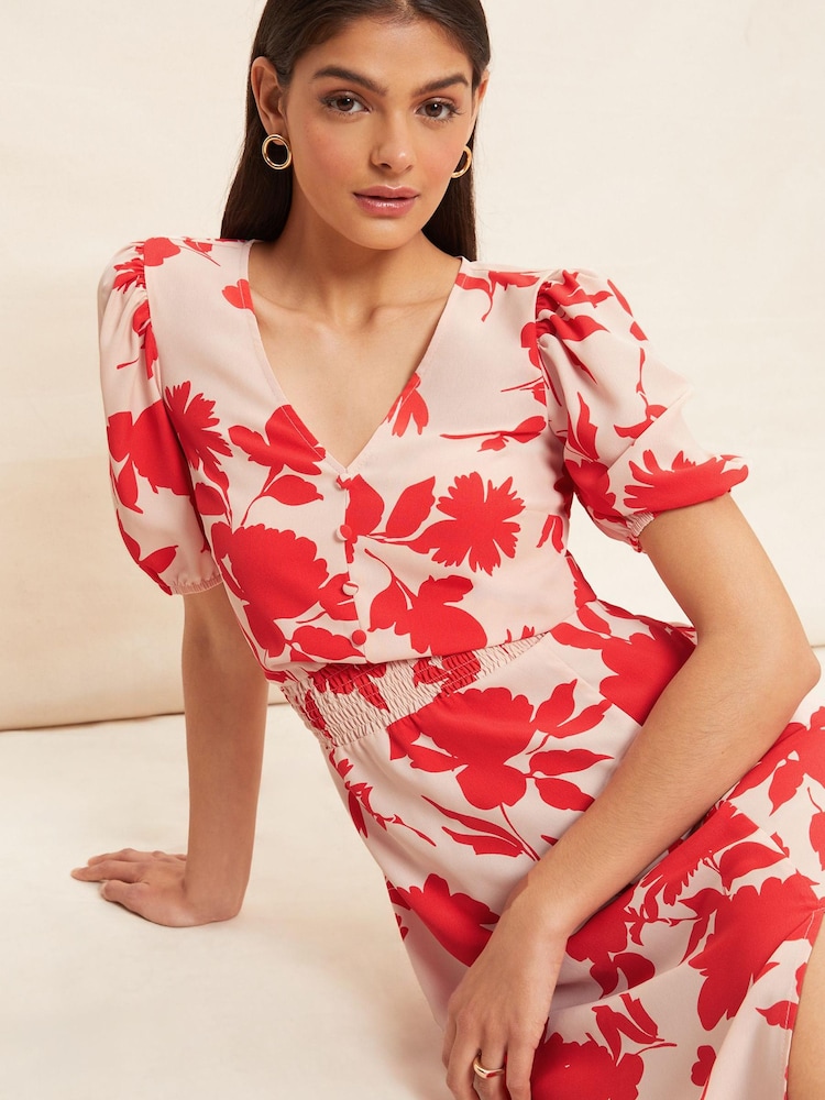 Friends Like These Pink Floral Puff Sleeve Ruched Waist V Neck Midi Summer Dress - Image 1 of 4 Friends Like These Pink Floral Puff Sleeve Ruched Waist V Neck Midi Summer Dress - Image 1 of 4