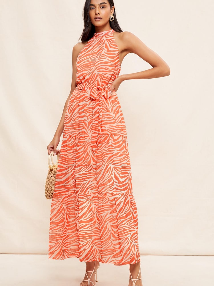 Friends Like These Orange Animal Printed Halter Neck Tiered Belted Maxi Dress - Image 1 of 4 Friends Like These Orange Animal Printed Halter Neck Tiered Belted Maxi Dress - Image 1 of 4