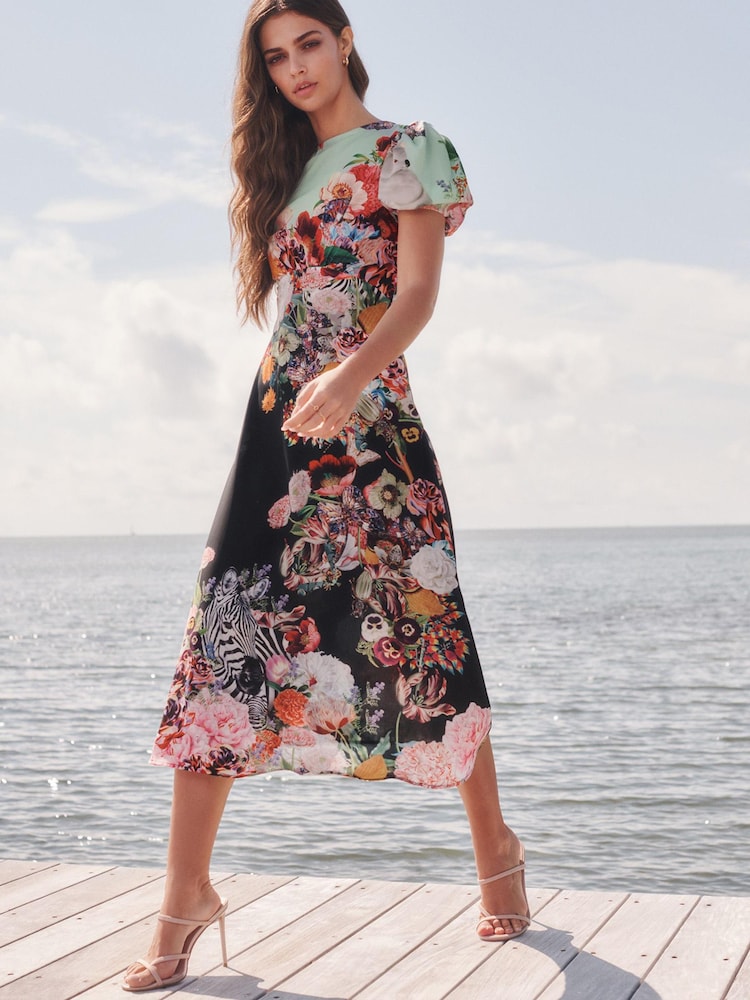 Mary Katrantzou x Lipsy Black Floral Short Sleeve Under Bust Midi Dress - Image 2 of 3 Mary Katrantzou x Lipsy Black Floral Short Sleeve Under Bust Midi Dress - Image 2 of 3