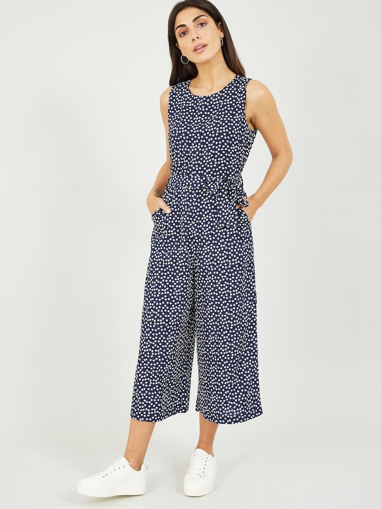 Mela Navy Blue Ditsy Floral Sleeveless Culotte Jumpsuit - Image 1 of 3 Mela Navy Blue Ditsy Floral Sleeveless Culotte Jumpsuit - Image 1 of 3