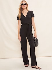 Friends Like These Black V Neck Short Sleeve Ribbed Jersey Wide Leg Jumpsuit - Image 1 of 4