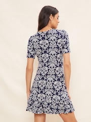 Friends Like These Navy Ikat Petite Print Short Sleeve Ruffle Hem Jersey Mini Dress - Image 2 of 4