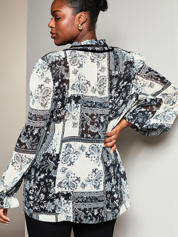 Schwarz mit Paisleymuster - Lipsy Durchsichtige, langärmelige Bluse mit Krawattenausschnitt - Bild 2 von 4 Schwarz mit Paisleymuster - Lipsy Durchsichtige, langärmelige Bluse mit Krawattenausschnitt - Bild 2 von 4