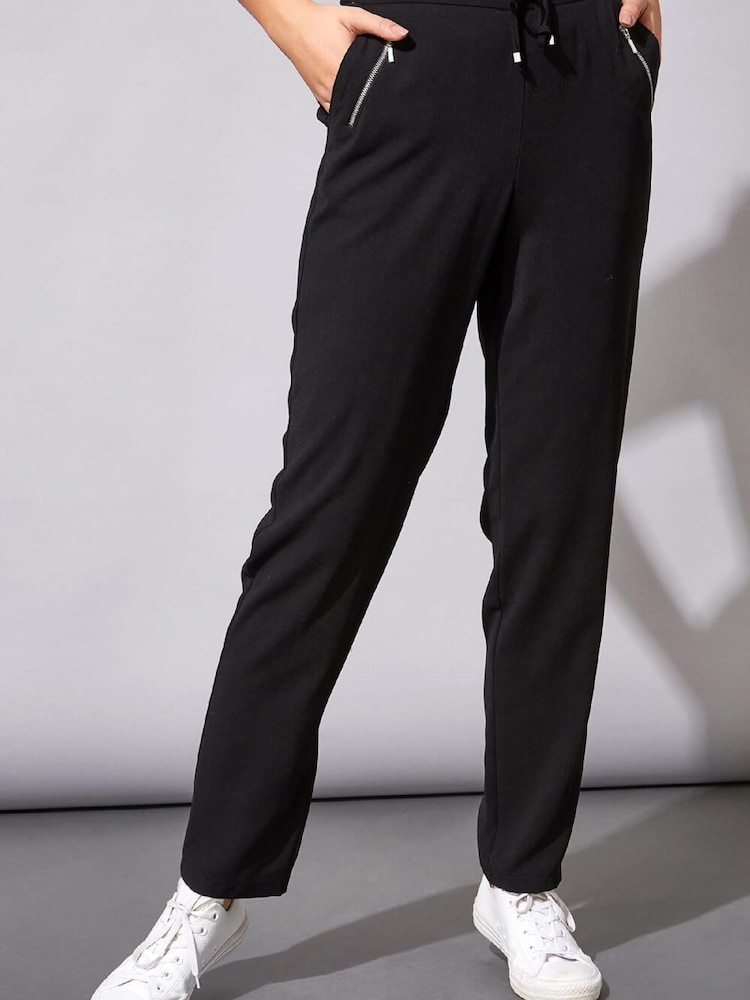 Roman Black 25” Tie Front Jogger - Image 1 of 4 Roman Black 25” Tie Front Jogger - Image 1 of 4