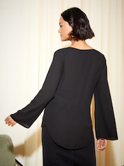 Friends Like These Black Long Flute Sleeve Lace Up Slim Fit Blouse - Image 2 of 4