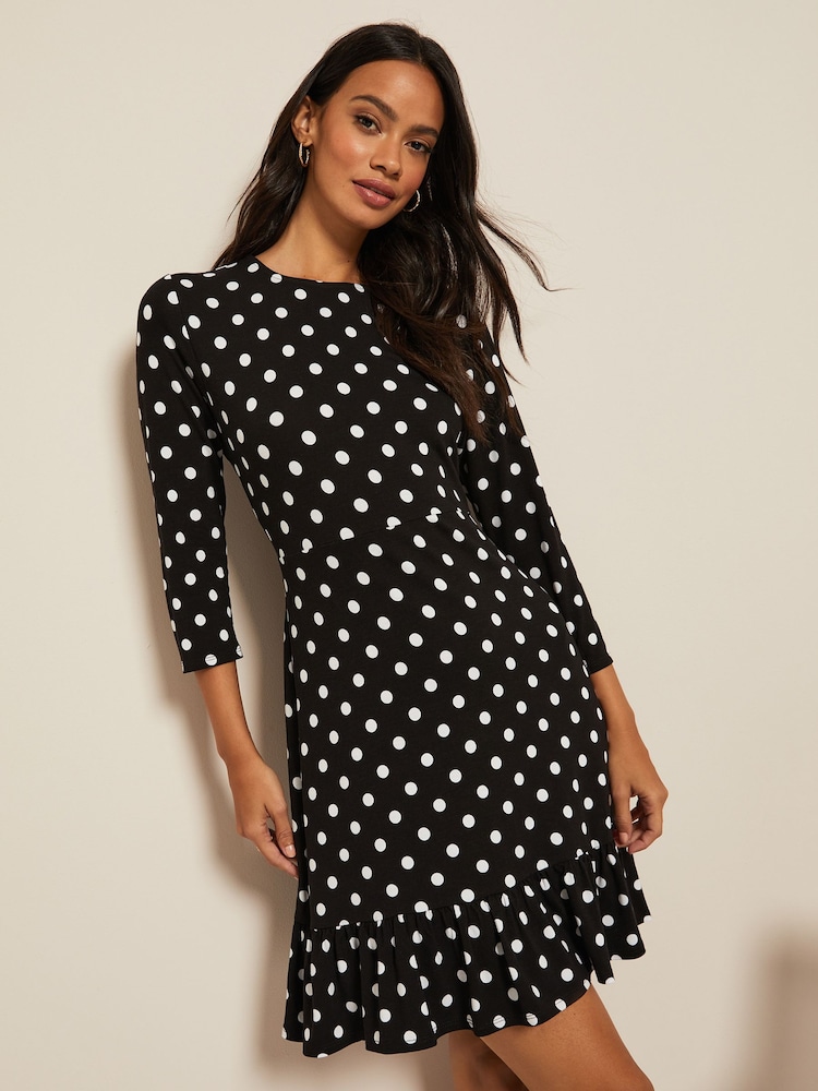 Schwarz/Weiß gepunktet - Friends Like These Ausgestelltes Kleid mit Rundhalsausschnitt und 3/4-Ärmeln - Bild 1 von 4 Schwarz/Weiß gepunktet - Friends Like These Ausgestelltes Kleid mit Rundhalsausschnitt und 3/4-Ärmeln - Bild 1 von 4