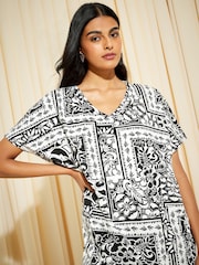 Friends Like These Black/White Tile Print Short Sleeve V Neck Tunic Top - Image 1 of 4