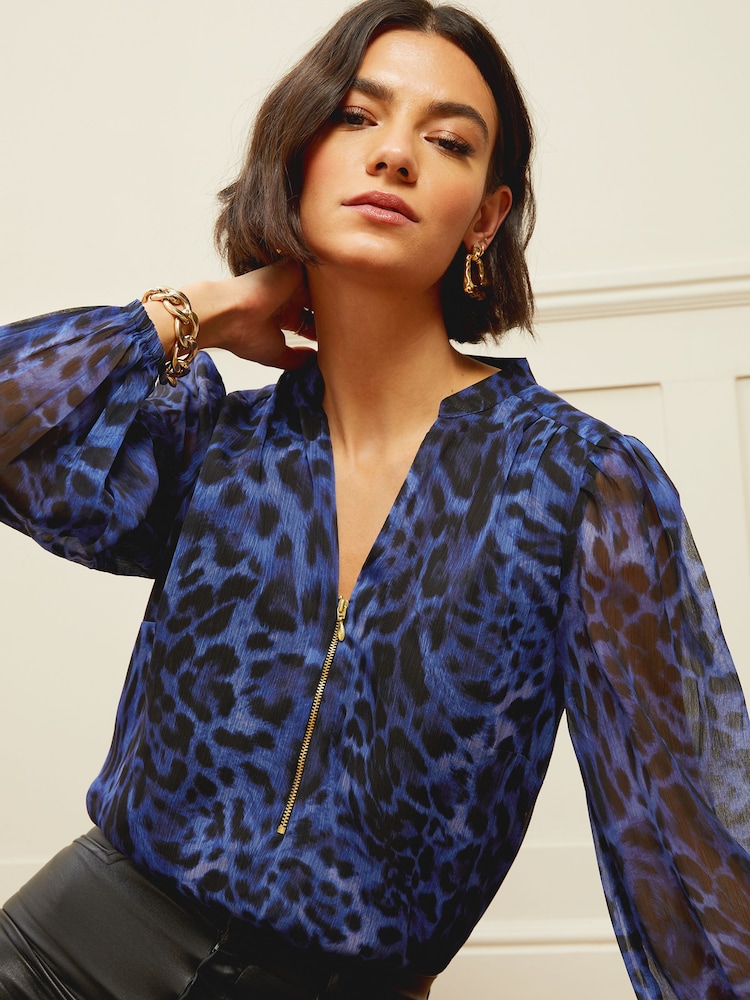 Marineblau mit Animalprint - Love & Roses Transparente Bluse mit Reissverschluss und langen Ärmeln - Bild 1 von 4 Marineblau mit Animalprint - Love & Roses Transparente Bluse mit Reissverschluss und langen Ärmeln - Bild 1 von 4