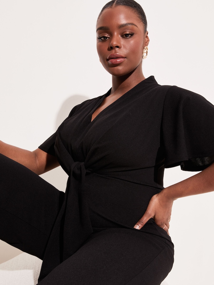 Lipsy Black Curve Flutter Sleeve V Neck Tie Front Wide Leg Jumpsuit - Image 4 of 4
