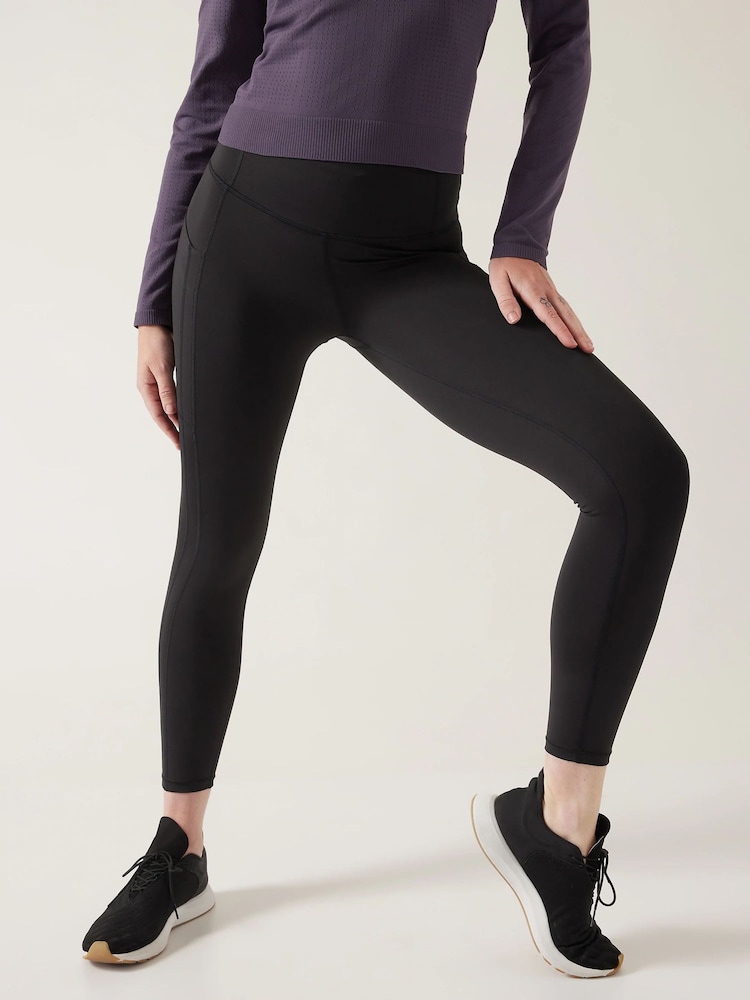 Athleta Black 7/8 Length Saluation High Waisted Pocket Leggings - Image 1 of 6 Athleta Black 7/8 Length Saluation High Waisted Pocket Leggings - Image 1 of 6