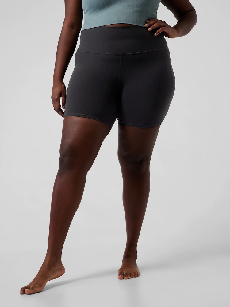 Athleta Black Long Length Salutation High Waisted Pocket Cycling Shorts - Image 1 of 6