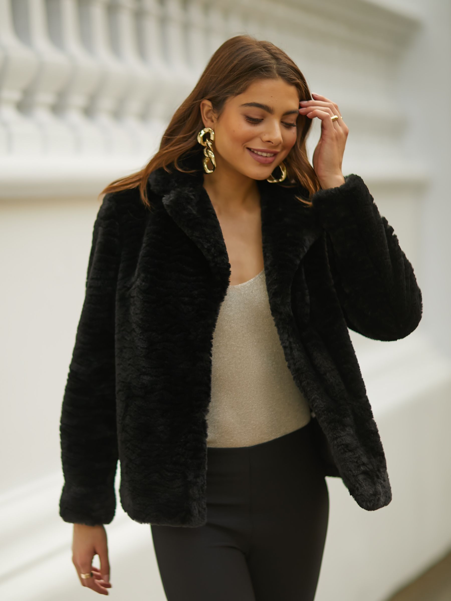 Petite black faux fur jacket top