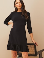 Friends Like These Jet Black Petite Fit And Flare Round Neck 3/4 Sleeve Dress - Image 1 of 4
