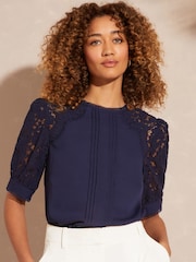 Love & Roses Navy Short Sleeve Lace Trim Bow Back Blouse - Image 1 of 4