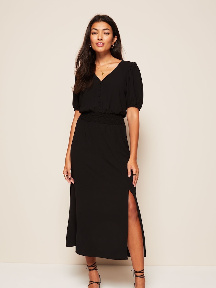 Friends Like These Black Petite Puff Sleeve Ruched Waist V Neck Midi Dress - Image 1 of 4 Friends Like These Black Petite Puff Sleeve Ruched Waist V Neck Midi Dress - Image 1 of 4