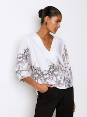 White/Black Floral Placement Linen Blend V-Neck 3/4 Sleeve Blouse - Image 1 of 6