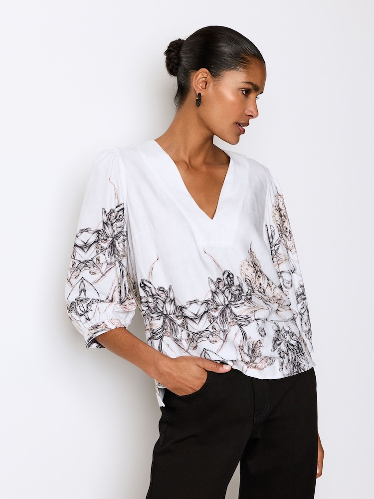 White/Black Floral Placement Linen Blend V-Neck 3/4 Sleeve Blouse - Image 1 of 6