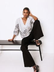 White/Black Floral Placement Linen Blend V-Neck 3/4 Sleeve Blouse - Image 2 of 6