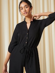 Friends Like These Black Jersey Long Sleeve Cinched Waist Jumpsuit - Image 2 of 4