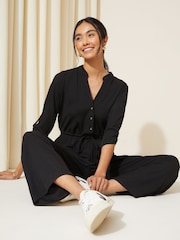 Friends Like These Black Petite Jersey Long Sleeve Cinched Waist Jumpsuit - Image 3 of 4