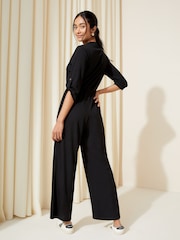 Friends Like These Black Petite Jersey Long Sleeve Cinched Waist Jumpsuit - Image 4 of 4