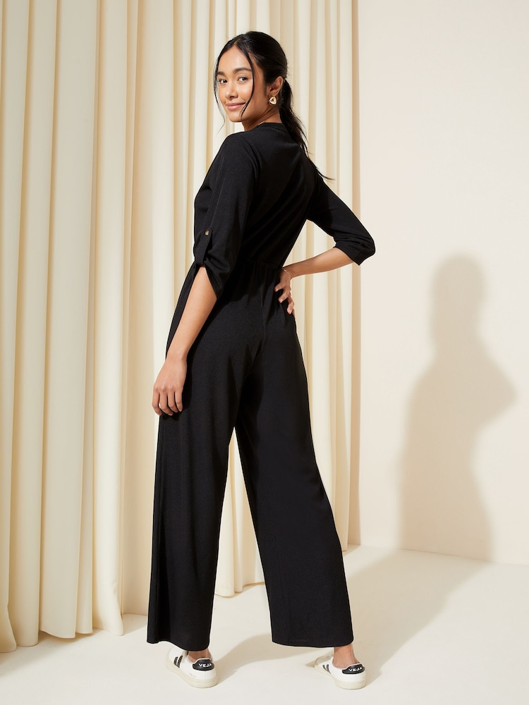 Friends Like These Black Petite Jersey Long Sleeve Cinched Waist Jumpsuit - Image 4 of 4