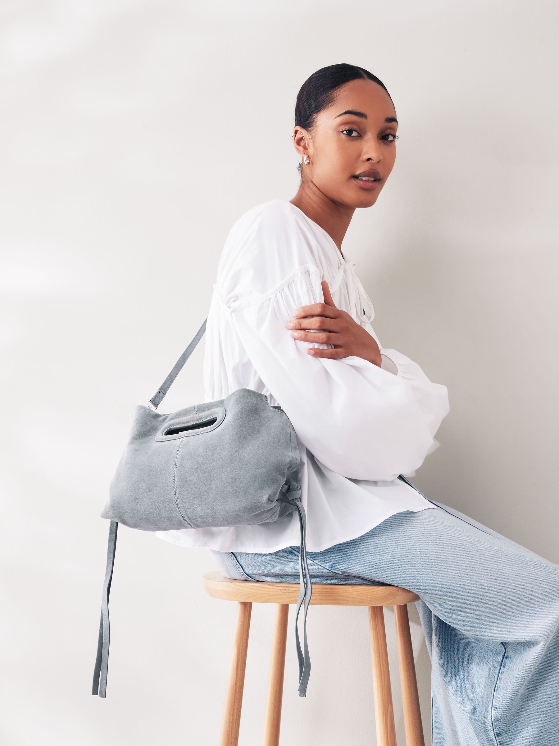 Blue suede cross body bag new arrivals