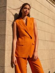 Orange Sleeveless Asymmetric Tailored Blazer - Image 1 of 6