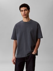 Calvin Klein Blue Oversized Embossed Logo T-Shirt - Image 1 of 5